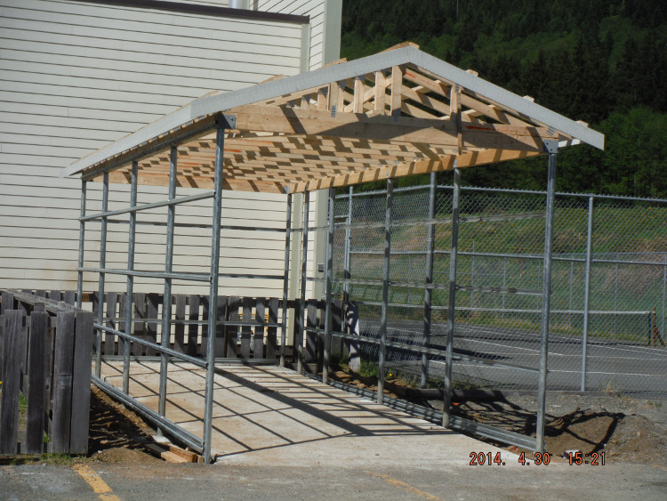 Steel and Wood shelter being built